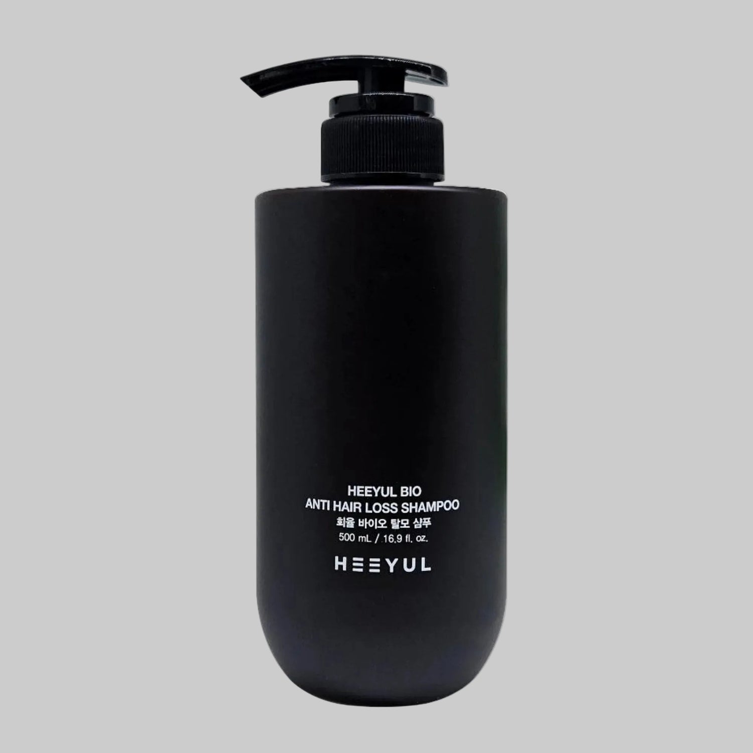 Black shampoo bottle with pump labeled 'HEEYUL BIO ANTI HAIR LOSS SHAMPOO 500ml' on a grey background