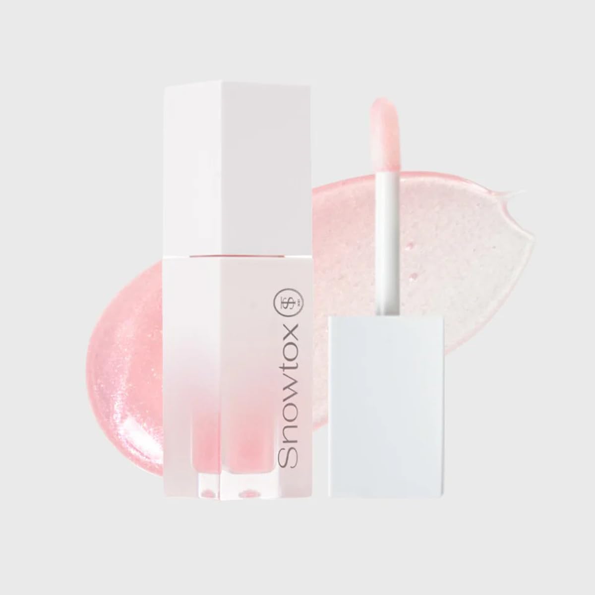 white snowtox lip plumper bottle with soft applicator tip and light pink product swatch