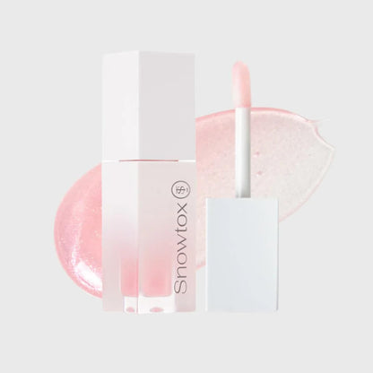 white snowtox lip plumper bottle with soft applicator tip and light pink product swatch