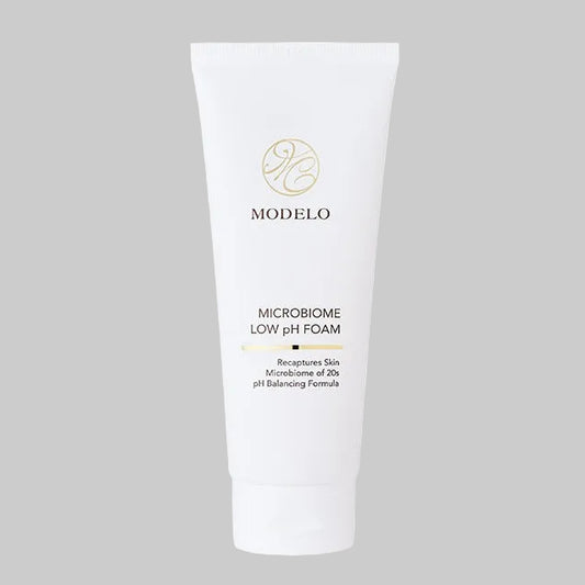 Modelo Microbiome Low PH Foam in a squeezable tube. Moisturizes, cleanses, and recaptures skin microbiome of 20s with pH balancing formula.